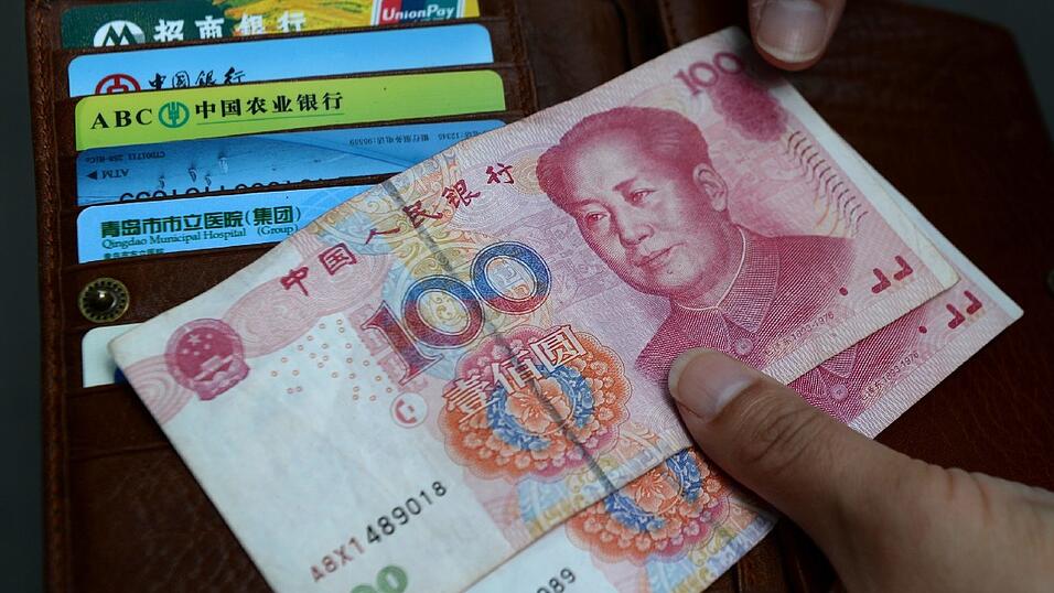 Seit einem Jahr können Unternehmen ihre China-Geschäfte auch von Frankfurt aus in Yuan abwickeln. Seit einem Jahr können Unternehmen ihre China-Geschäfte auch von Frankfurt aus in Yuan abwickeln.
