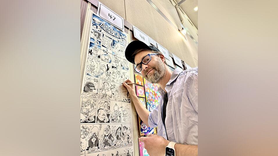 Daniel Stieglitz fertigt ein Comic-Panorama.