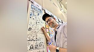 Daniel Stieglitz fertigt ein Comic-Panorama.