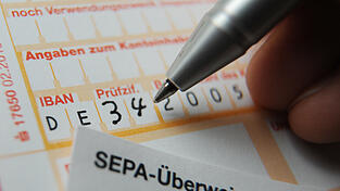 Bei der neuen Betrugsmasche manipulieren Kriminelle die Bankverbindung.