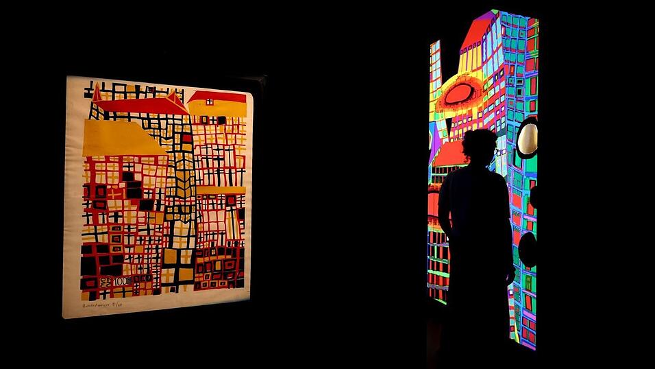 Hundertwasser ist bekannt f&uuml;r bunte Farben wie im Linolschnitt 'Drei hohe H&auml;user'.