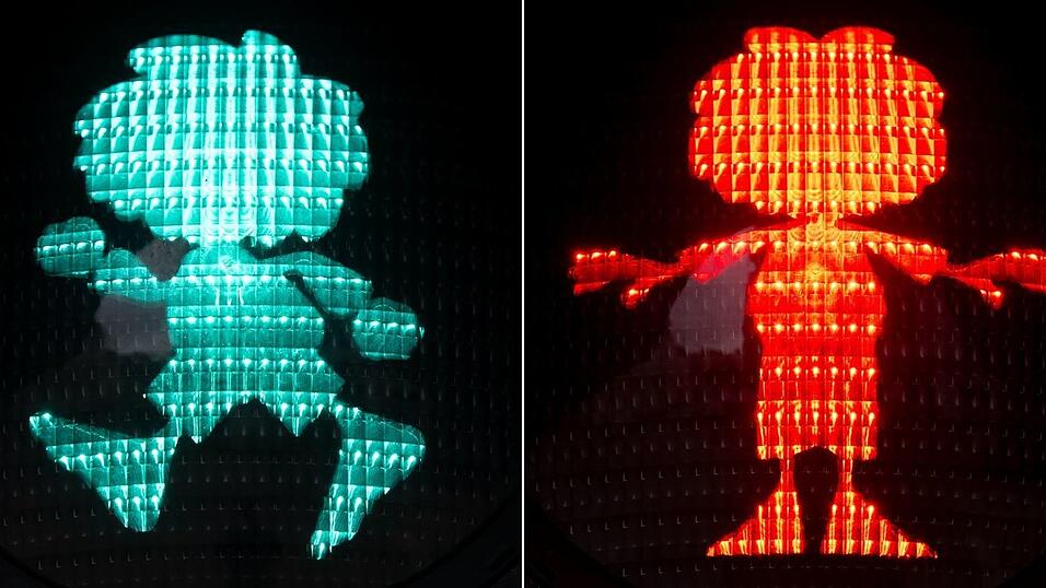 Bei Gr&uuml;n bewegt sich der Ampel-Pumuckl mit schnellen Schritten vorw&auml;rts, bei Rot streckt er die Arme aus, um Fu&szlig;g&auml;ngerinnen und Fu&szlig;g&auml;nger zum Warten aufzufordern.