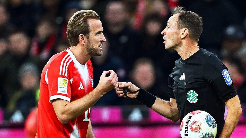 Harry Kane (l) war im Duell gegen den BVB überall im Einsatz.
