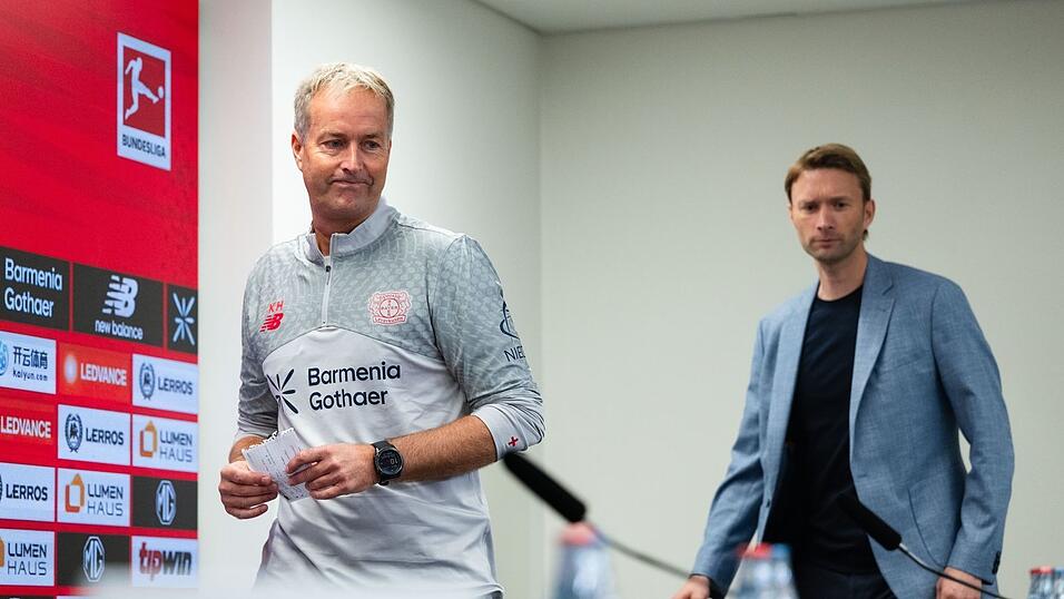 Zusammenarbeit endet: Hjulmand und Bayers Sportchef Rolfes.
