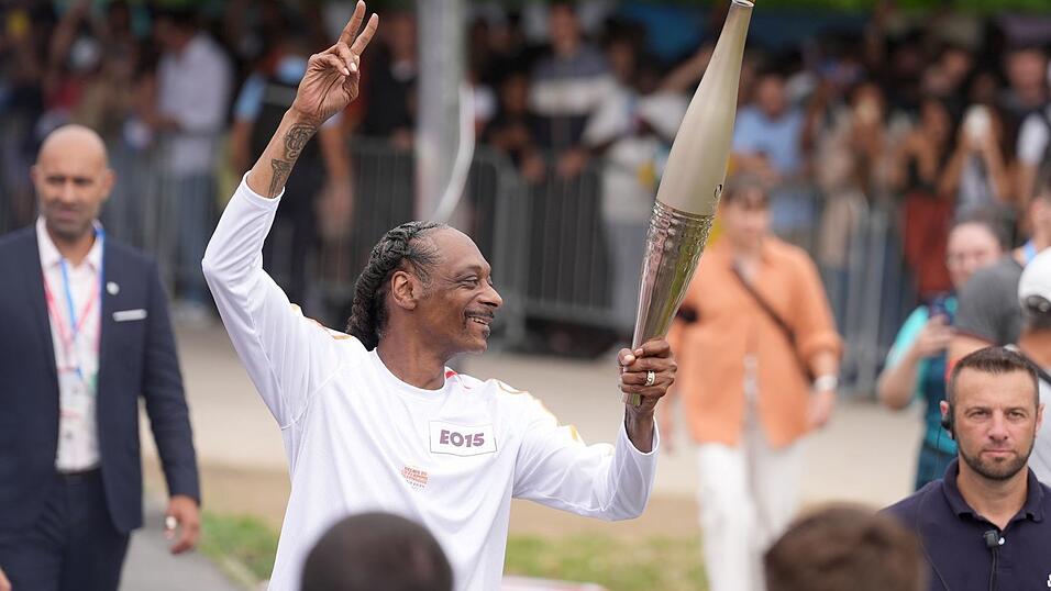 Auch  beim Fackellauf in Paris war Snoop Dogg