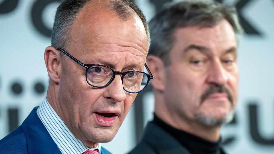 Markus Söder (r) steht trotz der Abstimmungsniederlage im Bundestag weiter hinter Unionskanzlerkandidat Friedrich Merz (Archivbild). Markus Söder (r) steht trotz der Abstimmungsniederlage im Bundestag weiter hinter Unionskanzlerkandidat Friedrich Merz (Archivbild).