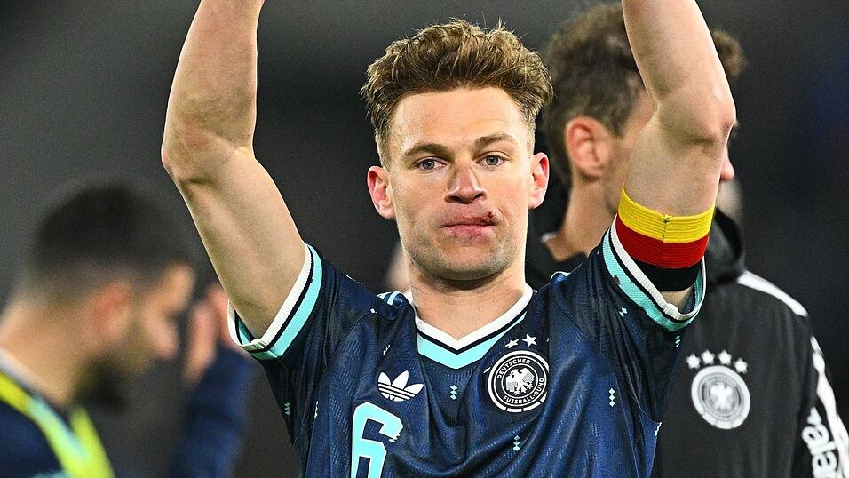 Joshua Kimmich feiert mit einer Verletzung an der Lippe den Sieg in der Schweiz. Joshua Kimmich feiert mit einer Verletzung an der Lippe den Sieg in der Schweiz.