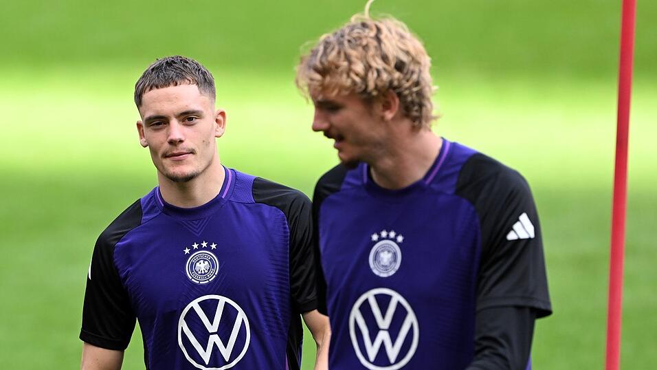 Florian Wirtz (l) und Nick Woltemade. (Archivbild)