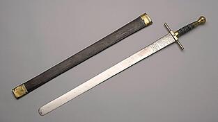 Ein Scharfrichterschwert zeichnet eine abgerundete Klinge aus. Diese sollte symbolisieren, dass es sich um ein reines Gerichtswerkzeug und nicht um eine Waffe für den Kampf handelt. Das Exponat stammt aus dem Jahr 1835, dem Todesjahr von Kunigunde Korherr. Ein Scharfrichterschwert zeichnet eine abgerundete Klinge aus. Diese sollte symbolisieren, dass es sich um ein reines Gerichtswerkzeug und nicht um eine Waffe für den Kampf handelt. Das Exponat stammt aus dem Jahr 1835, dem Todesjahr von Kunigunde Korherr.
