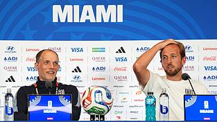 Harry Kane (r) springt Thomas Tuchel bei. Harry Kane (r) springt Thomas Tuchel bei.