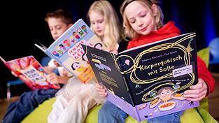 F&uuml;r Kinder bieten B&uuml;cher immer noch wertvolles Wissen und f&ouml;rdern die Fantasie.