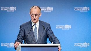 Bundeskanzler Merz betont Verl&auml;sslichkeit in der Klimapolitik.