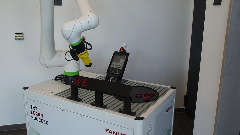 Dieser Roboter heißt die Besucher willkommen - buchstäblich.