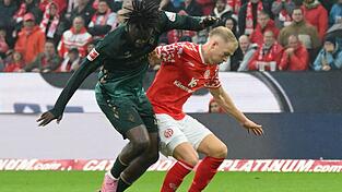 Kam gegen den FSV Mainz 05 nicht zur Geltung: Werder-Stürmer Victor Boniface (l).