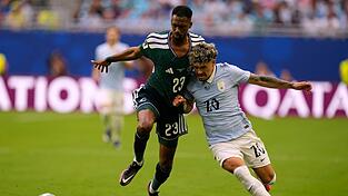 Das Spiel zwischen Uruguay und Saudi-Arabien war hart umkämpft. Das Spiel zwischen Uruguay und Saudi-Arabien war hart umkämpft.