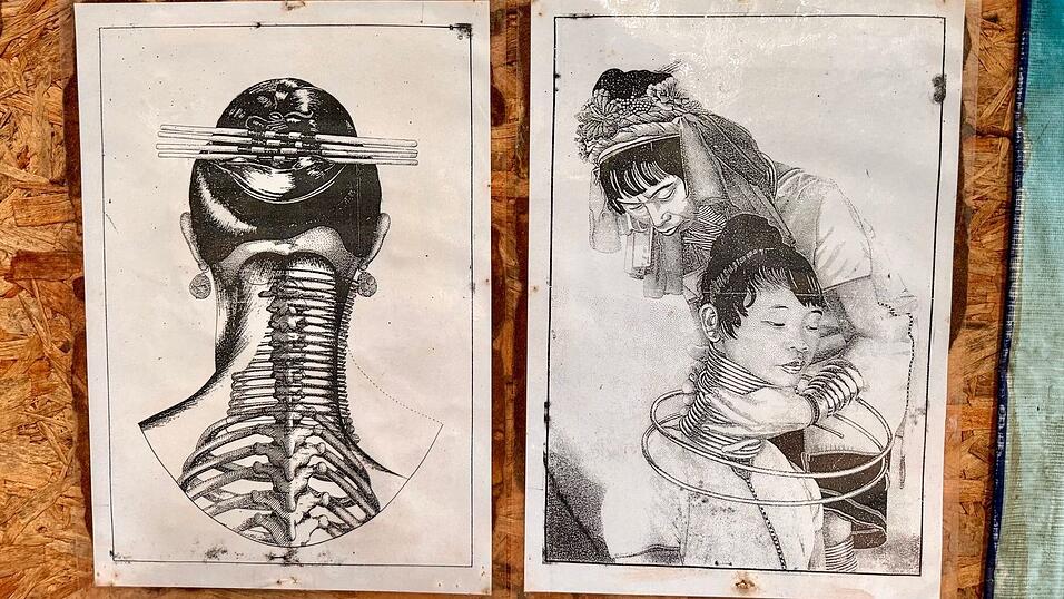 Der Hals wirkt durch die Messingringe länger - aber das ist eine Illusion. Der Hals wirkt durch die Messingringe länger - aber das ist eine Illusion.