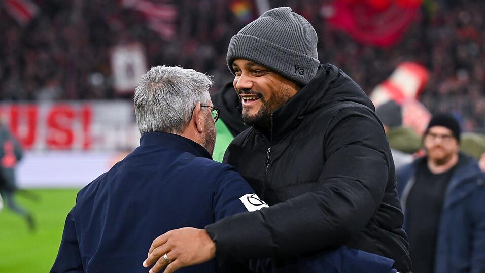 Bayern-Trainer Kompany (r) begrüßt den neuen Mainzer Coach Fischer. Bayern-Trainer Kompany (r) begrüßt den neuen Mainzer Coach Fischer.