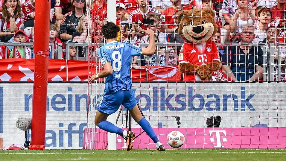 Eren Dink&ccedil;i  schiebt den Ball zum Heidenheimer 2:0 ins Tor.