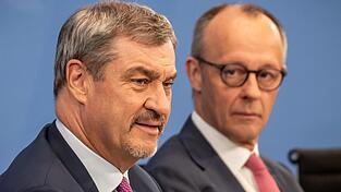 Bayerns Ministerpr&auml;sident und CSU-Chef Markus S&ouml;der (l.) sowie Bundeskanzler und CDU-Vorsitzender Friedrich Merz m&uuml;ssen derzeit vermehrt Mutma&szlig;ungen - die auch von Parteikollegen gestreut werden - entgegentreten, nach denen sie ihren Zenit bereits &uuml;berschritten haben.