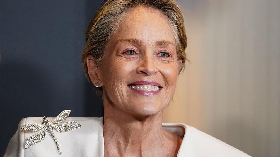 US-Filmstar Sharon Stone (&laquo;Basic Instinct&raquo;) begleitet den &ouml;sterreichischen S&uuml;&szlig;waren-Unternehmer Karl Guschlbauer zum Wiener Opernball.