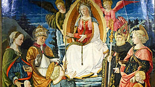 „Thronende Muttergottes mit Kind und Heiligen“. Die heilige Margareta (l.) soll die Gesichtszüge der Novizin Lucretia Buti tragen, der Geliebten des Malermönches Filippo Lippi.