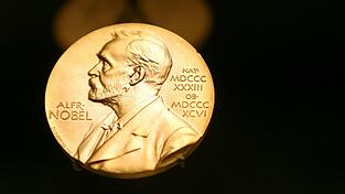 Neben dem Preisgeld gibt es für die Geehrten eine goldene Medaille. (Illustration) Neben dem Preisgeld gibt es für die Geehrten eine goldene Medaille. (Illustration)