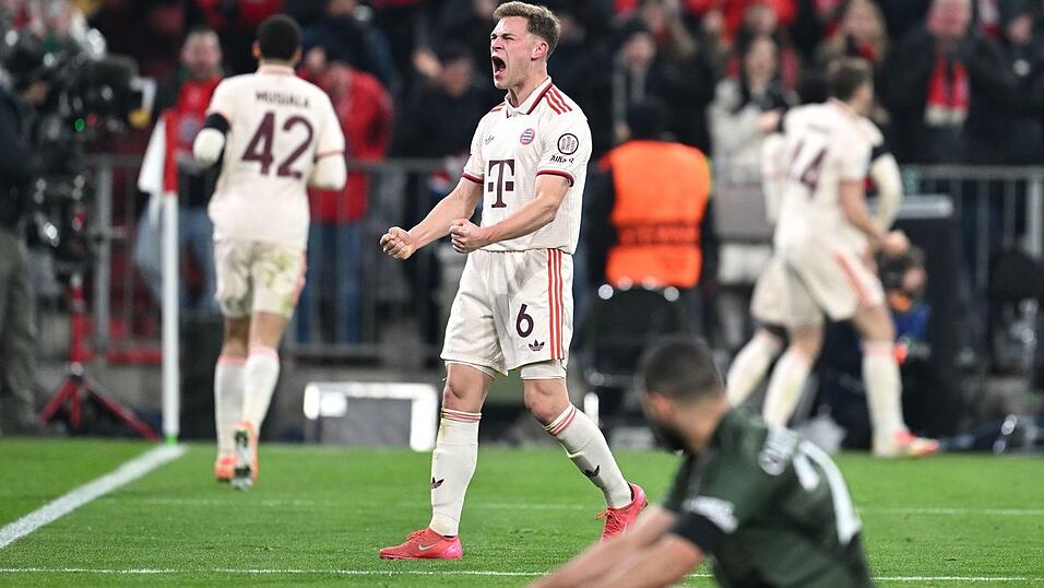 Der Moment der Befreiung und Erlösung: Joshua Kimmich (M) beim Jubel nach dem ganz späten Ausgleichstor des FC Bayern. Der Moment der Befreiung und Erlösung: Joshua Kimmich (M) beim Jubel nach dem ganz späten Ausgleichstor des FC Bayern.