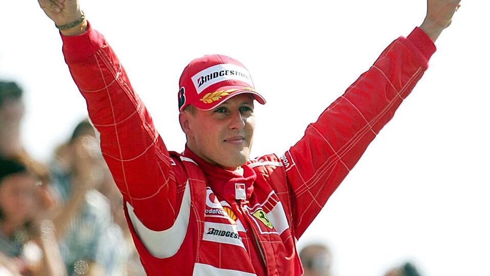 Formel-1-Legende Michael Schumacher, damals Scuderia Ferrari, feiert seinen Sieg beim Großen Preis von Italien in Monza im Jahr 2006.