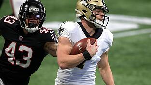 Die New Orleans Saints, hier Quarterback Taysom Hill (rechts), haben sich die Playoff-Teilnahme gesichert.