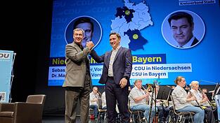 Bayerns Ministerpr&auml;sident und CSU-Chef Markus S&ouml;der (l) unterst&uuml;tzt Niedersachsens CDU vor der Kommunalwahl.