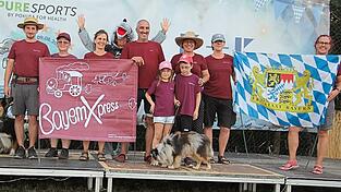 Das Team von &bdquo;BayernXpress&ldquo; aus Bodenkirchen mit seinen zwei- und vierbeinigen Mitgliedern.