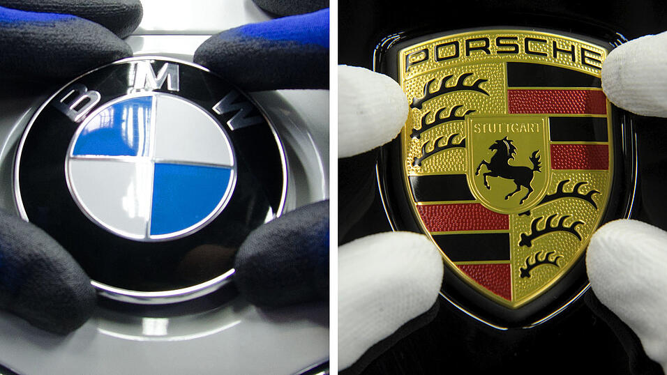 Die Firmenlogos von BMW (l) und Porsche Die Firmenlogos von BMW (l) und Porsche