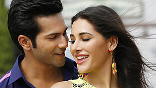 Die indischen Schauspieler Varun Dhawan (l) und Nargis Fakhri (r) in einer Szene der indischen Filmkomödie 'Main Tera Hero' aus dem Jahr 2014. Einer von Indiens größten TV-Konzernen startet einen Sender in Deutschland. Die indischen Schauspieler Varun Dhawan (l) und Nargis Fakhri (r) in einer Szene der indischen Filmkomödie 'Main Tera Hero' aus dem Jahr 2014. Einer von Indiens größten TV-Konzernen startet einen Sender in Deutschland.