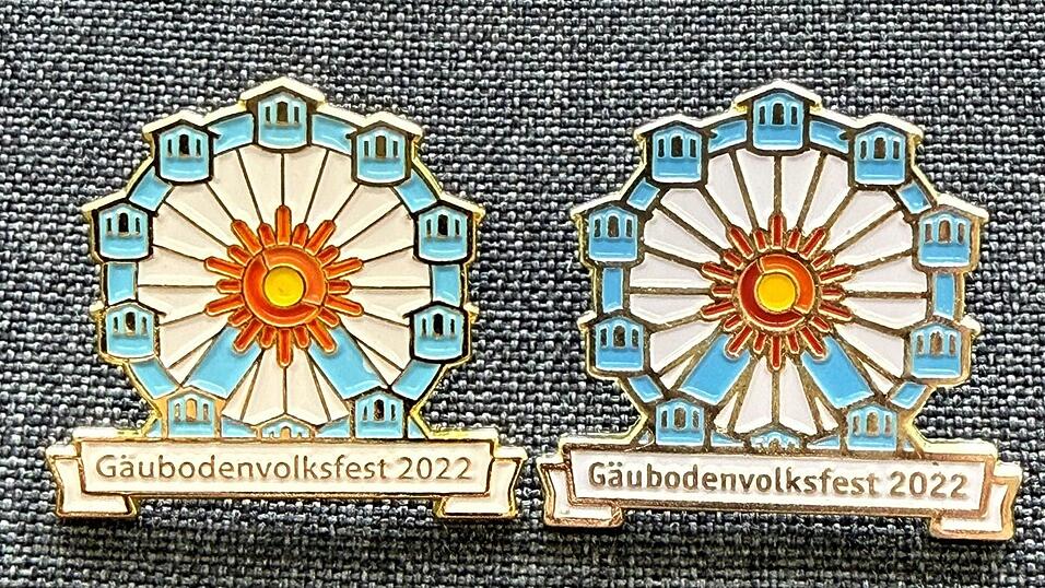 Auf dem Foto handelt es sich rechts um das Original. Links ist der gef&auml;lschte Pin zu sehen. Dessen Speicher sind zum Beispiel viel filigraner als beim Original-Sammlerpin des G&auml;ubodenvolksfestes.