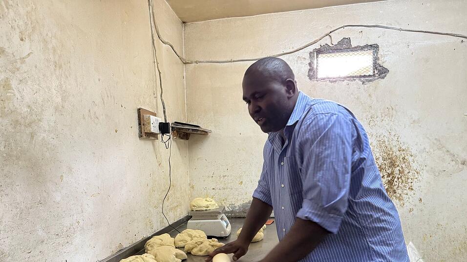 Der Bäcker Greyson Nyenze in seiner Backstube im kenianischen Slum Kibera. (Archivbild) Der Bäcker Greyson Nyenze in seiner Backstube im kenianischen Slum Kibera. (Archivbild)