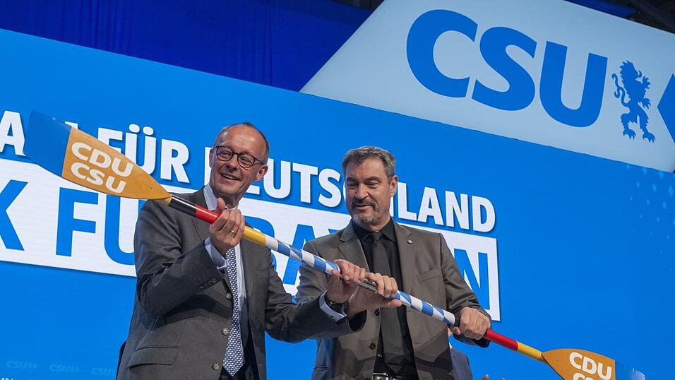 Friedrich Merz (l.) und Markus Söder wollen künftig in die gleiche Richtung paddeln. Friedrich Merz (l.) und Markus Söder wollen künftig in die gleiche Richtung paddeln.