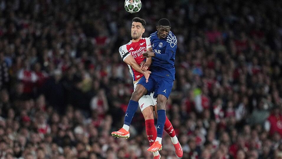 Treffen am Samstag erneut aufeinander: Arsenals Mikel Merino und Ousmane Dembele (r) von PSG. (Archivbild)