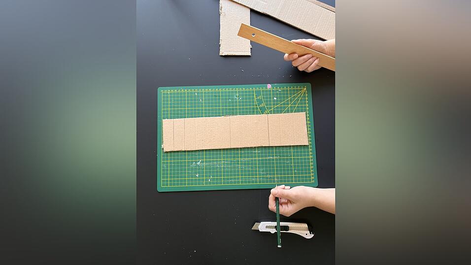 So sollten die Markierungen auf dem Karton verteilt sein.