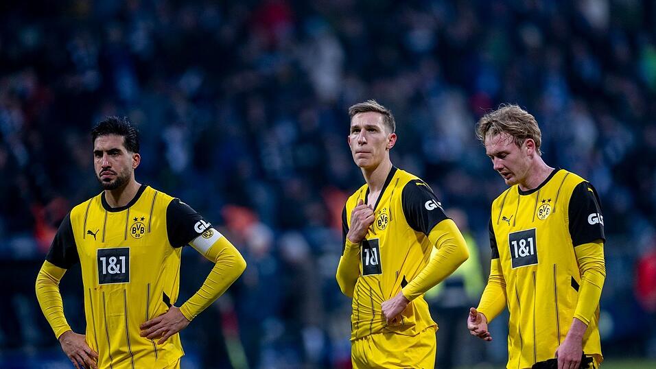 Frust und Ratlosigkeit: Dortmunds Emre Can (l-r), Nico Schlotterbeck und Julian Brandt