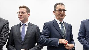 M&uuml;ssen nach der Wahl aller Voraussicht nach miteinander regieren: Manuel Hagel und Cem &Ouml;zdemir. (Archivbild)