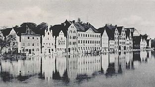 So sah es früher am Isargestade aus. An Stelle der drei Häuser vor der Brücke soll jetzt der Neubau entstehen. So sah es früher am Isargestade aus. An Stelle der drei Häuser vor der Brücke soll jetzt der Neubau entstehen.